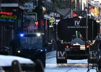 A truck cleans Bourbon Street in the French Quarter of New Orleans, Louisiana on January 2, 2025, one day after a terrorist attack that left at least 14 people dead and 30 injured. ©AFP