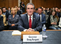 Former North Dakota Governor Doug Burgum takes his seat as he arrives for a Senate Energy and Natural Resources Committee hearing  / ©AFP