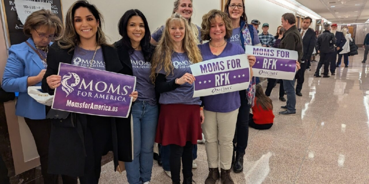 Chana Walker (3rd L) poses with members of Moms for America at the US Senate on Capitol Hill in Washington, DC, on January 30, 2025 / ©AFP