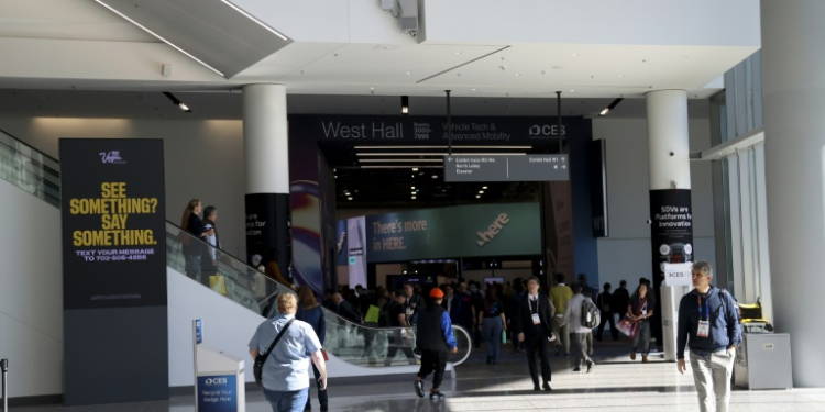 Attendees walk through the main entrance during the Consumer Electronics Show in Las Vegas on January 10, 2025. ©AFP