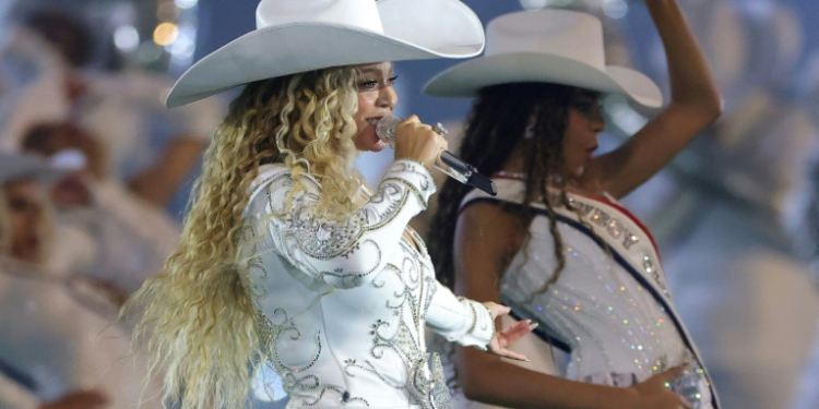 Beyonce, shown here performing with her daughter Blue Ivy during an NFL game on Christmas Day 2024, is the artist with the most Grammys ever. ©AFP