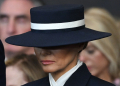 US First Lady Melania Trump stands for a benediction after President Donald Trump was sworn in as the 47th US President in the US Capitol Rotunda in Washington, DC, on January 20, 2025 / ©AFP