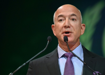 Jeff Bezos, pictured in November 2021, founded Blue Origin two years before Elon Musk started SpaceX -- but the company has progressed at a far slower pace. ©AFP