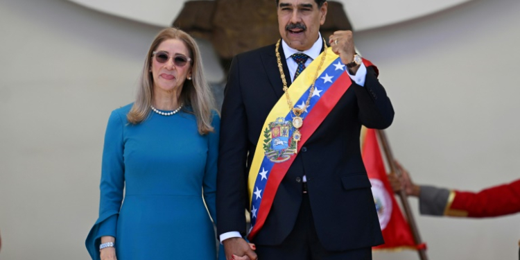 Venezuelan President Nicolas Maduro waves to supporters after his swearing-in ceremony. ©AFP