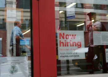 US hiring surged past expectations in December while unemployment dipped, according to government figures. ©AFP