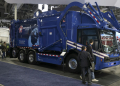 Oshkosh's all-electric garbage and recycling vehicle is outfitted with AI that can identify load hazards and tell if recycling bins have been contaminated with other refuse. ©AFP