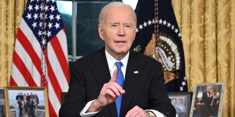 US President Joe Biden delivering his farewell address to the nation from the Oval Office of the White House / ©AFP