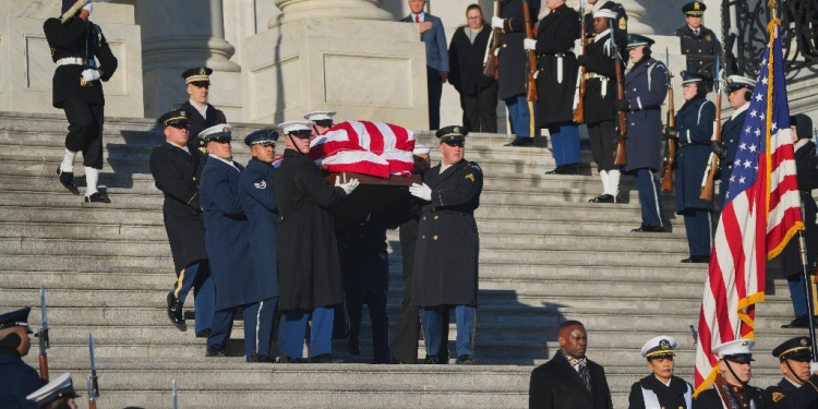 The remains of former US President Jimmy Carter leave the US Capitol for the State Funeral Service at the Washington National Cathedral in Washington, DC, on January 9, 2025. / ©AFP