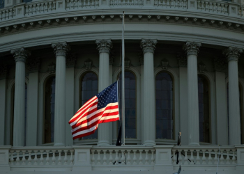 US House Speaker Mike Johnson said the flag would be returned to half-staff the day after the January 20 inauguration. ©AFP