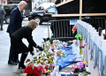 Joe and Jill Biden paid their respects to the 14 people killed in a truck-ramming attack in New Orleans on New Year's Day / ©AFP