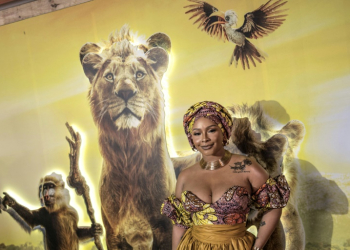 Television personality Boity Thulo poses on the red carpet at the South African premiere of Disney’s 'Mufasa: The Lion King' in Johannesburg on December 12, 2024 . ©AFP