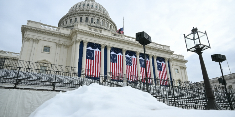 Snow piled up at the US Capitol, where the presidential inauguration traditionally takes place -- Donald Trump said the ceremony would be indoors due to the cold / ©AFP