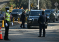 Police are setting up checkpoints to control who goes in and out of areas affected by the major fires burning around Los Angeles. ©AFP