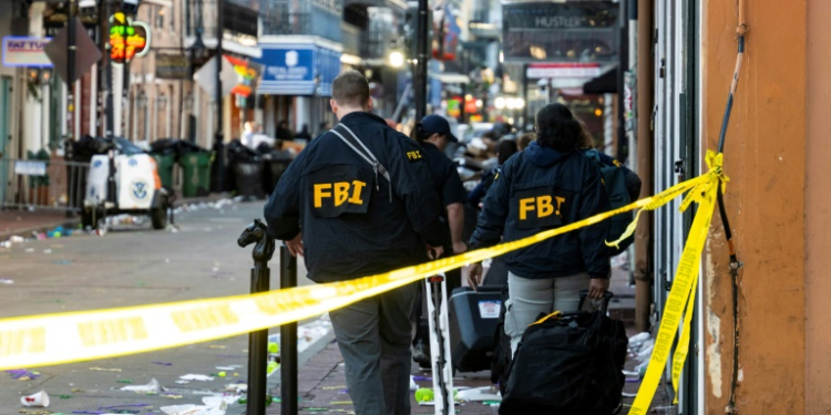 FBI investigators scour the New Orleans scene of a mass casualty attack by a man in a Ford pickup truck, who drove into a New Year's crowd. ©AFP