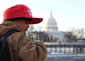 A man wears a MAGA hat near the US Capitol on Inauguration Day / ©AFP