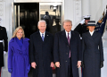 US President Joe Biden and First Lady Jill Biden pose alongside President-elect Donald Trump and Melania Trump as they arrive at the White House in Washington, DC, on January 20, 2025, before departing for the US Capitol where Trump will be sworn in as the 47th US President. / ©AFP