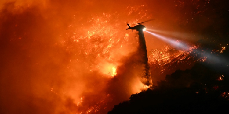 The Palisades Fire grew overnight to 23,700 acres (9,500 hectares) burnt, remaining just 11 percent contained. ©AFP