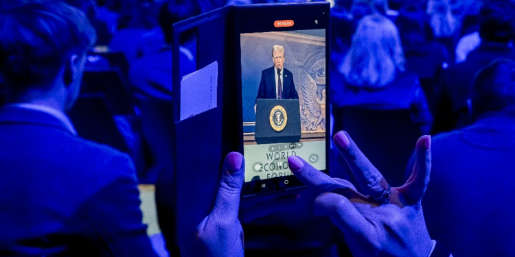 US President Donald Trump spoke in a packed hall with politicians and executives at Davos after his inauguration / ©AFP