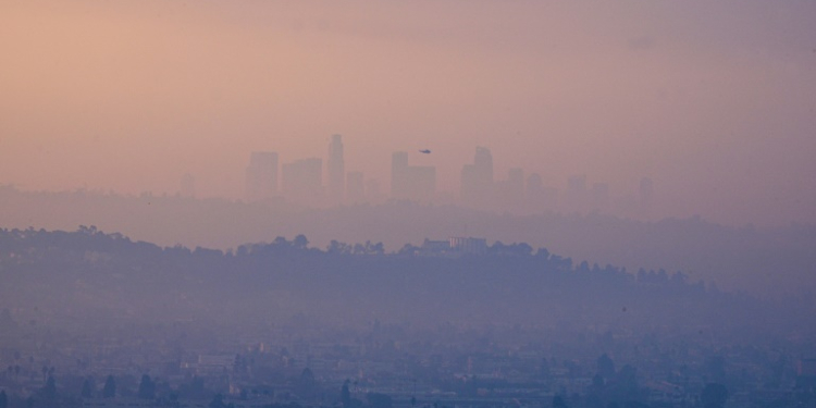 Wildfires roaring around Los Angeles have left much of the reagion wreathed in toxic smoke. ©AFP