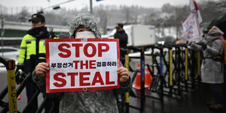 South Koreans have used the slogan invoking US President-elect Donald Trump who used the term after his 2020 presidential election loss / ©AFP