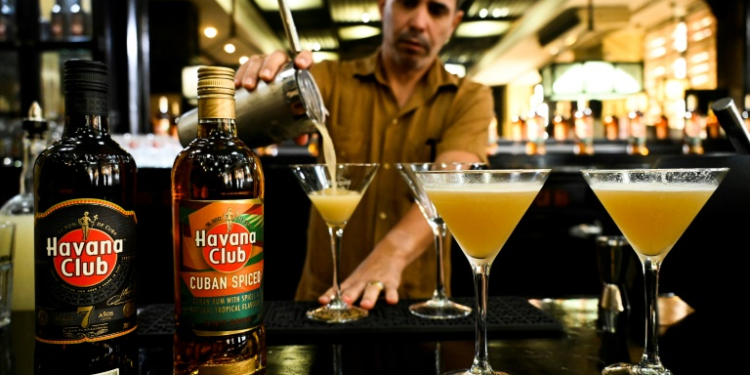 A bartender prepares a cocktail with the new Havana Club Cuban Spiced rum at Havana's rum museum in 2022. ©AFP