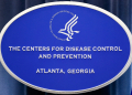 A sign with the logo for the Centers for Disease Control and Prevention at the Tom Harkin Global Communications Center on October 5, 2014 in Atlanta, Georgia / ©AFP