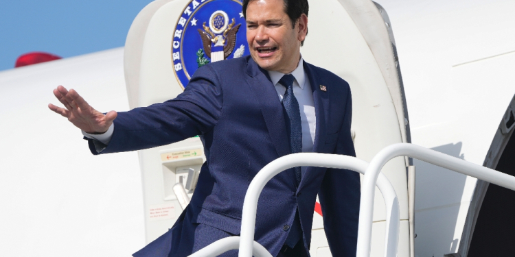 Top US diplomat Marco Rubio, pictured here leaving Panama for El Salvador, is advocating President Donald Trump's immigration policies / ©AFP